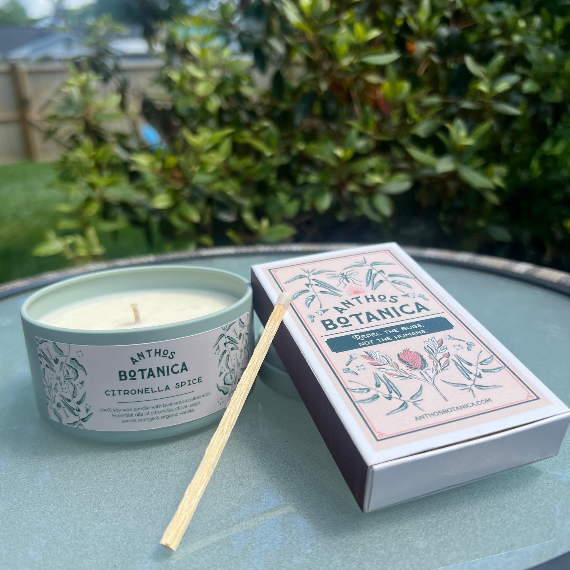 Matchbox and Citronella candle out on the patio